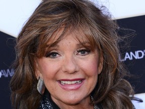 (FILES) In this file photo taken on April 11, 2015 US actress Dawn Wells poses at the 2015 TV Land Awards at the Saban Theatre in Los Angeles.