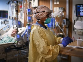 FILE: An ICU health-care worker.