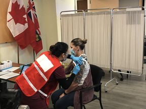 Jo-Anne Miner, personal support worker at St. Patrick's Home, was the first to receive the COVID-19 vaccine at the Ottawa Hospital.