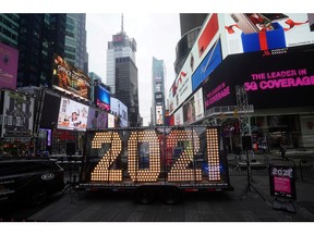 These '2021' numerals are being placed atop a building for New Year's Eve in Times Square, New York. Most of us can't wait to leave 2020 behind.