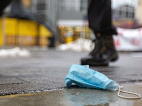 FILE: A discarded medical mask.