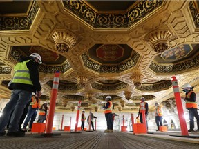 Workers inspect the Senate chambers ceiling.
