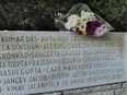 Flowers placed at the Air India Memorial monument in Vancouver's Stanley Park.