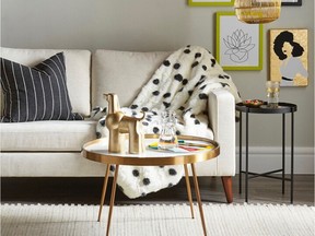 Creating stylish comfort is as easy as a few pillows, a new area rug and a throw. Polka Dot Decorative Throw, $60, Marshalls.ca