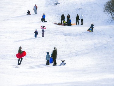 People were well spaced apart and respecting the guidelines Saturday Jan. 9, 2021, while enjoying the beautiful sunshine and tobogganing at  Carlington Park hill.