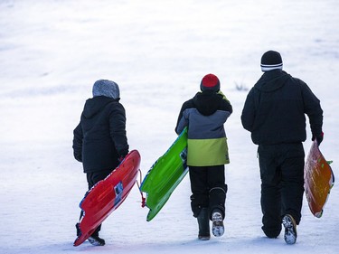 People were well spaced apart and respecting the guidelines Saturday Jan. 9, 2021, while enjoying the beautiful sunshine and tobogganing at  Carlington Park hill.  Matt McKay brought his sons ten-year-old Dylan and 12-year-old Maxwell out for some fresh air and fun at the hill Saturday.
