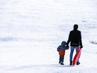 People were well spaced apart and respecting the guidelines Saturday Jan. 9, 2021, while enjoying the beautiful sunshine and tobogganing at  Carlington Park hill.