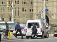 Police lock down Parliament Hill on Oct. 22, 2014, after a shooter rushes into the Centre Block.