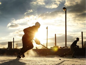 Hockey sticks and pucks are banned from Ottawa rinks during the COVID-19 lockdown. File photo.