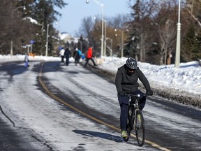 People braved the chilly temperatures to enjoy a section of Queen Elizabeth Driveway that was closed to traffic this month for people to safely be active outside during the current COVID-19 restrictions.