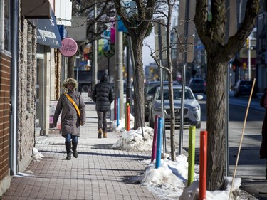 The bright sun helped to get people out and about on the chilly day Ottawa had Sunday Jan. 30, 2021. Shoppers and walkers made their way down Richmond Road Saturday morning.