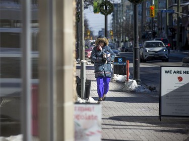 The bright sun helped to get people out and about on the chilly day Ottawa had Sunday Jan. 30, 2021. Shoppers and walkers made their way down Richmond Road Saturday morning.