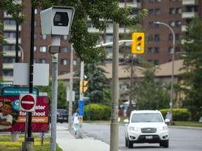 A photo radar camera and signage along Bayshore Drive in a file photo from July 2020.