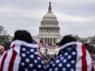 WASHINGTON, DC - JANUARY 06: Pro-Trump supporters storm the U.S. Capitol following a rally with President Donald Trump on January 6, 2021 in Washington, DC. Trump supporters gathered in the nation's capital today to protest the ratification of President-elect Joe Biden's Electoral College victory over President Trump in the 2020 election.