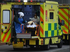 : A patient arrives by ambulance at the Royal London hospital on January 8, 2021 in London, England. London Mayor Sadiq Khan has warned that "if we do not take immediate action now, our NHS could be overwhelmed and more people will die"