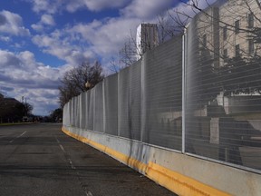 Security fencing runs down an empty street near the U.S. Capitol on January 17, 2021 in Washington, DC.