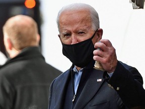 US President-elect Joe Biden leaves The Queen theater in Wilmington, Delaware on January 18, 2021.