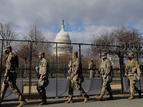 Members of the National Guard patrol near the U.S. Capitol building ahead of U.S. President-elect Joe Biden's inauguration, in Washington, U.S., January 19, 2021.