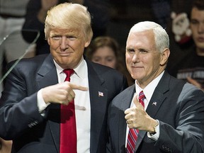 In happier times, Donald Trump and Mike Pence celebrate victory together in the 2016 general election in Cincinnati, Ohio.
