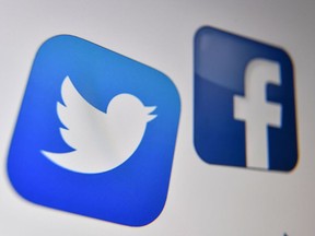 Files: Facebook and Twitter on a computer screen.