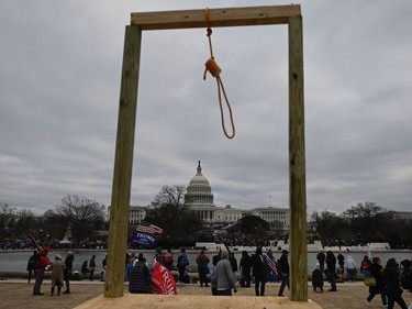 Supporters of US President Donald Trump gather on the West side of the US Capitol in Washington DC on January 6, 2021. - Demonstrators breeched security and entered the Capitol as Congress debated the a 2020 presidential election Electoral Vote Certification. (Photo by ANDREW CABALLERO-REYNOLDS / AFP)