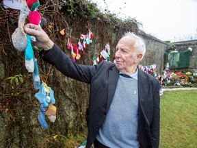 Walter Francis, a survivor of the Bon Secours Mother and Baby Home, poses at a shrine in Tuam, County Galway in January 13, 2021, erected in memory of up to 800 children who were allegedly buried at the site of the former home for unmarried mothers run by nuns.