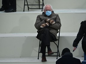 Former presidential candidate, Senator Bernie Sanders (D-Vermont) sits in the bleachers on Capitol Hill before Joe Biden is sworn in as the 46th US President on January 20, 2021, at the US Capitol in Washington, DC.