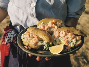 Baked potatoes stuffed with shrimp and smoked salmon mayonnaise from Aegean.