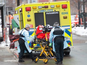 A patient is transported from Verdun hospital Tuesday, January 12, 2021 in Montreal.