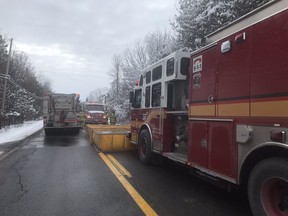 Firefighters shuttled water to a fire on rural Eighth Line Road Thursday
