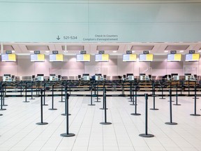 An empty check-in counter at Toronto's Pearson International Airport in a file photo from late June.