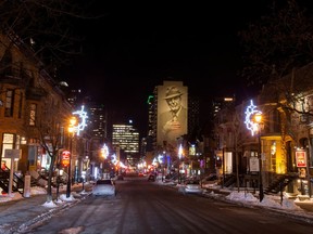 FILE PHOTO: Crescent Street, a street known for its nightlife, is seen on the first night after a curfew is imposed by the Quebec government to help slow the spread of the coronavirus disease (COVID-19) pandemic in Montreal, Quebec, Canada January 9, 2021.