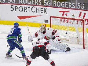 Vancouver Canucks forward Tanner Pearson (70) scores on Ottawa Senators goalie Matt Murray (30) in the second period at Rogers Arena. Vancouver won 7-1.