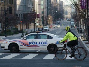 Extensive road closures are seen on a street near the White House in Washington, DC on January 13, 2021, as the city makes preparations for the lead up to US President-elect Joe Biden's January 20, 2021 inauguration.