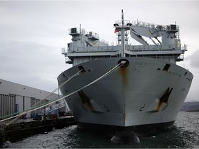 Victoria, B.C., December 18, 2018-- The MV Asterix, a commercial container ship converted into a supply ship for the Royal Canadian Navy sits docked at Ogden Point. Chad Hipolito/Postmedia