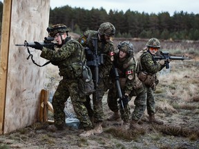 Canadian Armed Forces members with enhanced Forward Presence battlegroup Latvia conduct a quick shoot exercise.