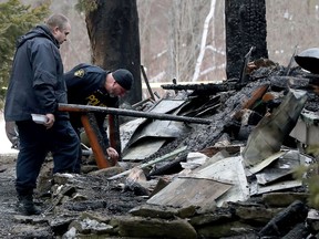 OPP and fire investigators at a fire scene on Stone Road near Oxford Mills Monday Jan 11, 2021.