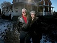 Dale and Lois Keyes pose for a photo outside their home.