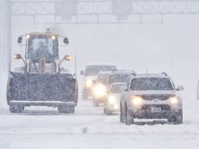 Files: Snow removal equipment and vehicles make their way. It's going to be 'that kind of day' today.