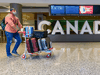Files: A traveller walks through the Calgary Airport on Wednesday, December 30, 2020.