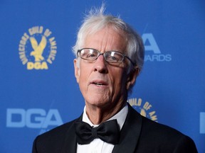 FILE PHOTO: Robert Aldrich Award recipient Michael Apted attends the 65th annual Directors Guild of America Awards in Los Angeles, California February 2, 2013.