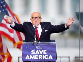 U.S. President Donald Trump's personal lawyer Rudy Giuliani gestures as he speaks as Trump supporters gather by the White House ahead of his speech to contest the certification by the U.S. Congress of the results of the 2020 U.S. presidential election in Washington, U.S, January 6, 2021.