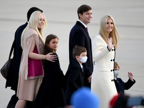 Family members of then-President Donald Trump arrive at Joint Base Andrews in Suitland, Md, on January 20, 2021.