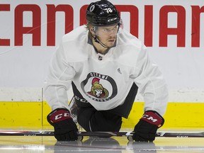Filip Chlapik stretches as the Ottawa Senators practice at Canadian Tire Centre on Monday, Jan 13, 2020.