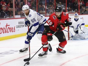 Tampa Bay Lightning
Braydon Coburn battles with Ottawa Senators Scott Sabourin at the Canadian Tire Centre on Oct. 12, 2019.