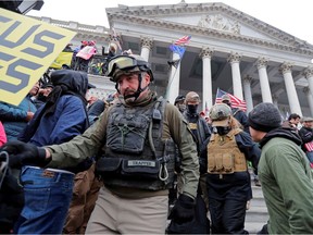 FILE PHOTO: Members of the Oath Keepers are seen among supporters of U.S. President Donald Trump at the U.S. Capitol during a protest against the certification of the 2020 U.S. presidential election results by the U.S. Congress, in Washington, U.S., January 6, 2021.