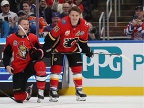 Files: Brady Tkachuk #7 of the Ottawa Senators talks with Matthew Tkachuk #19 of the Calgary Flames in the Bud Light NHL Save Streak during the 2020 NHL All-Star Skills Competition at Enterprise Center on January 24, 2020