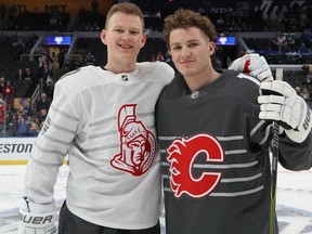 File photo/ Brady Tkachuk #7 of the Ottawa Senators and Matthew Tkachuk #19 of the Calgary Flames pose for a photo prior to the 2020 Honda NHL All-Star Game at Enterprise Center on January 25, 2020 in St Louis, Missouri.