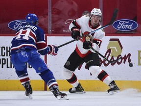 File photo/ Thomas Chabot #72 of the Ottawa Senators plays the puck past Brendan Gallagher #11 of the Montreal Canadiens during the third period at the Bell Centre on February 4, 2021 in Montreal, Canada.  The Ottawa Senators defeated the Montreal Canadiens 3-2.