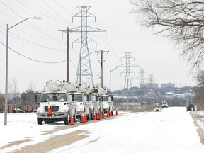 FORT WORTH, TX - FEBRUARY 16: Pike Electric service trucks line up after a snow storm on February 16, 2021 in Fort Worth, Texas. Winter storm Uri has brought historic cold weather and power outages to Texas as storms have swept across 26 states with a mix of freezing temperatures and precipitation.